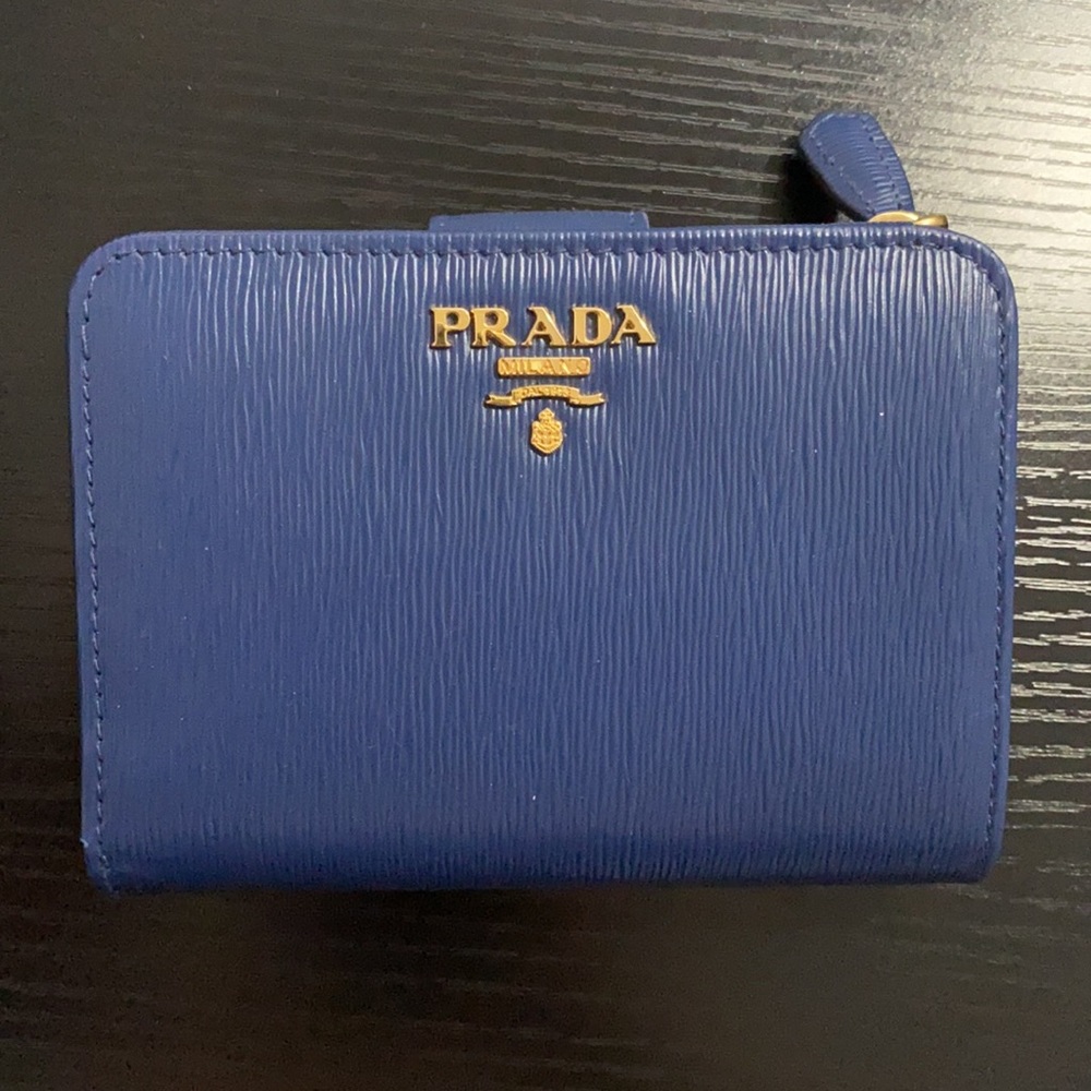 Prada small saffiano leather wallet in bluette.